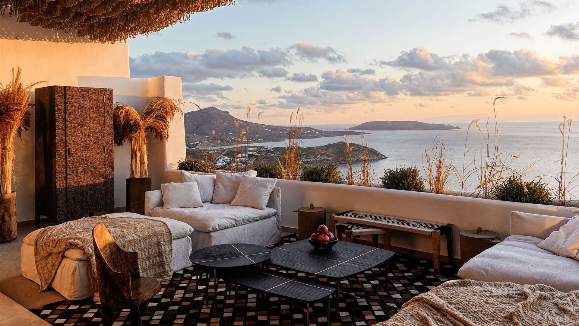 Panoptis Escape Mykonos suite terrace with ocean sunset views